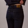 Blugi croiți, cu talie înaltă și picioare evazate Blugi croiți, cu talie înaltă și picioare evazate