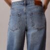 Blugi cropped cu croi evazat