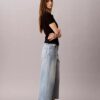 Blugi cropped cu picior larg