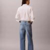 Blugi cropped cu picior larg