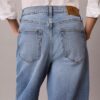 Blugi cropped cu picior larg