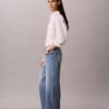 Blugi cropped cu picior larg