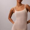 Body-ul minimalist din plasă până la jumătatea coapsei