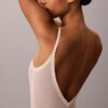 Body-ul minimalist din plasă până la jumătatea coapsei
