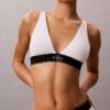 Bralette triunghiulară din microfiber elastic cu monogramă grafică, ușor căptușită