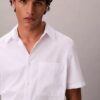 Cămașă clasică cu nasturi din seersucker uni Cămașă clasică cu nasturi din seersucker uni