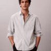 Cămașă din poplin spălat cu dungi vopsite în fir Cămașă din poplin spălat cu dungi vopsite în fir