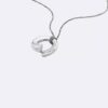 Colier cu pandantiv rotund sculptural Colier cu pandantiv rotund sculptural