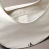 Geantă crossbody convertibilă, curbată Geantă crossbody convertibilă, curbată