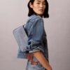 Geantă de umăr convertibilă din denim cu logo Geantă de umăr convertibilă din denim cu logo