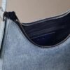Geantă de umăr din denim cu logo în formă de semilună