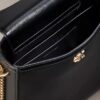 Geantă tip șa cu lanț și Monogram