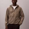 Jachetă windbreaker cu logo emblematic pe toată suprafața Jachetă windbreaker cu logo emblematic pe toată suprafața