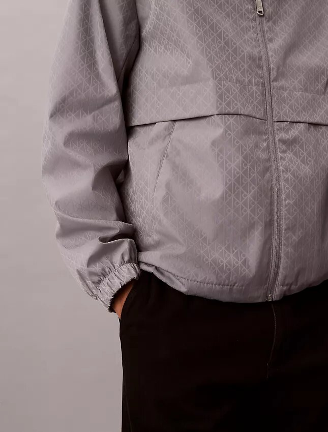 Jachetă windbreaker cu logo pe toată suprafața Jachetă windbreaker cu logo pe toată suprafața