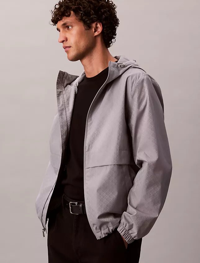 Jachetă windbreaker cu logo pe toată suprafața Jachetă windbreaker cu logo pe toată suprafața