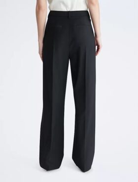 Pantaloni croiți cu picior larg