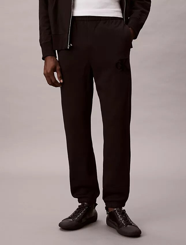 Pantaloni de jogging cu patch Monogram din fleece Pantaloni de jogging cu patch Monogram din fleece