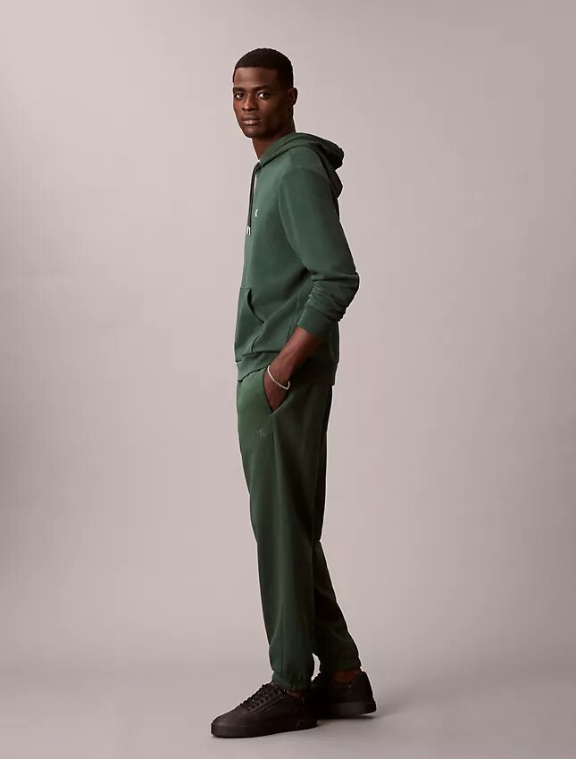 Pantaloni de jogging din fleece cu logo arhivă Pantaloni de jogging din fleece cu logo arhivă