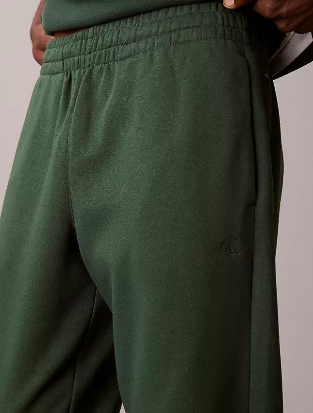 Pantaloni de jogging din fleece cu logo arhivă Pantaloni de jogging din fleece cu logo arhivă