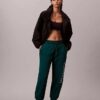 Pantaloni de jogging din fleece cu logo grafic Pantaloni de jogging din fleece cu logo grafic