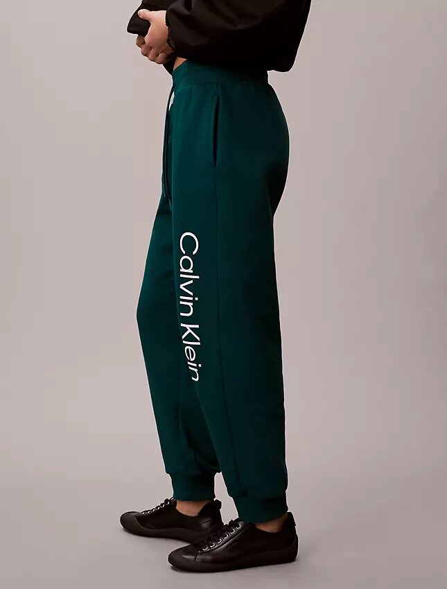 Pantaloni de jogging din fleece cu logo grafic Pantaloni de jogging din fleece cu logo grafic