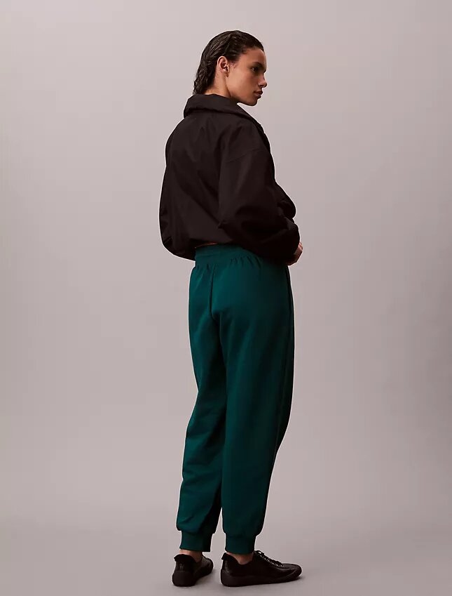 Pantaloni de jogging din fleece cu logo grafic Pantaloni de jogging din fleece cu logo grafic