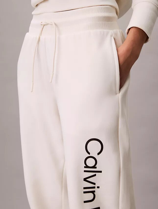 Pantaloni de jogging din fleece cu logo grafic Pantaloni de jogging din fleece cu logo grafic