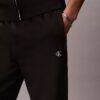Pantaloni de jogging din fleece cu monogramă