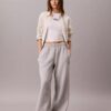 Pantaloni de trening din fleece cu croi larg Monologo Pantaloni de trening din fleece cu croi larg Monologo