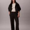 Pantaloni de trening din fleece cu croi larg Monologo Pantaloni de trening din fleece cu croi larg Monologo