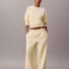 Pantaloni de trening din fleece cu croi larg Monologo Pantaloni de trening din fleece cu croi larg Monologo