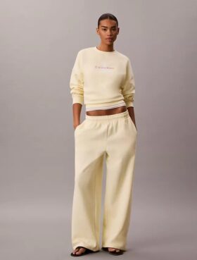 Pantaloni de trening din fleece cu croi larg Monologo