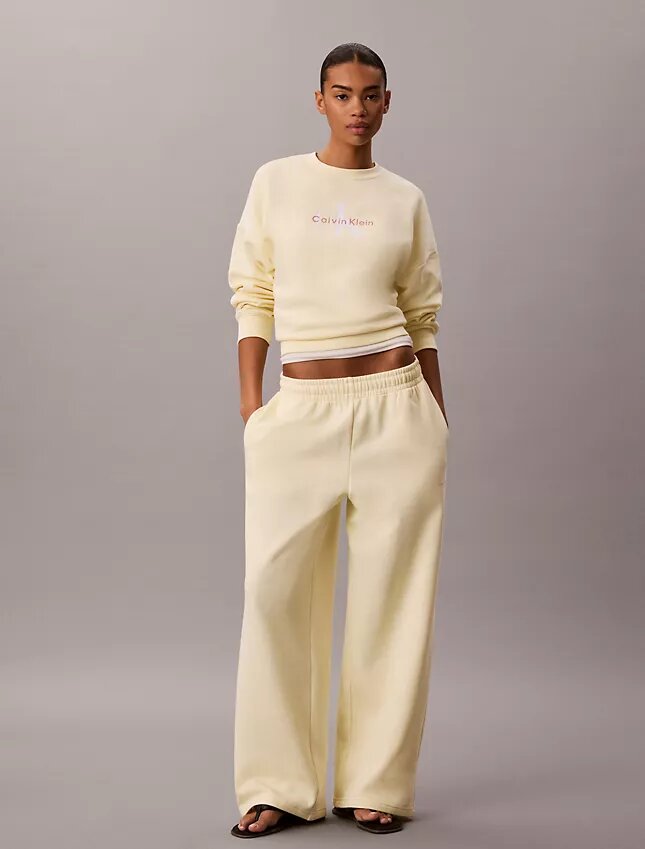Pantaloni de trening din fleece cu croi larg Monologo Pantaloni de trening din fleece cu croi larg Monologo