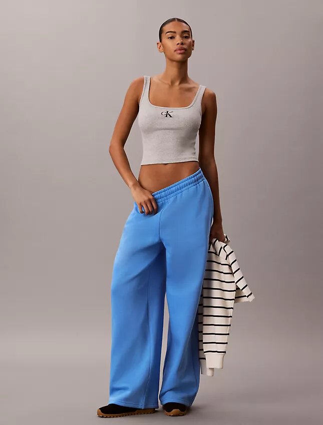 Pantaloni de trening din fleece cu croi larg Monologo Pantaloni de trening din fleece cu croi larg Monologo