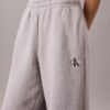 Pantaloni de trening din fleece cu croi larg Monologo Pantaloni de trening din fleece cu croi larg Monologo
