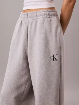 Pantaloni de trening din fleece cu croi larg Monologo