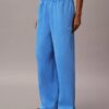 Pantaloni de trening din fleece cu croi larg Monologo Pantaloni de trening din fleece cu croi larg Monologo