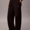 Pantaloni de trening din fleece cu croi larg Monologo Pantaloni de trening din fleece cu croi larg Monologo