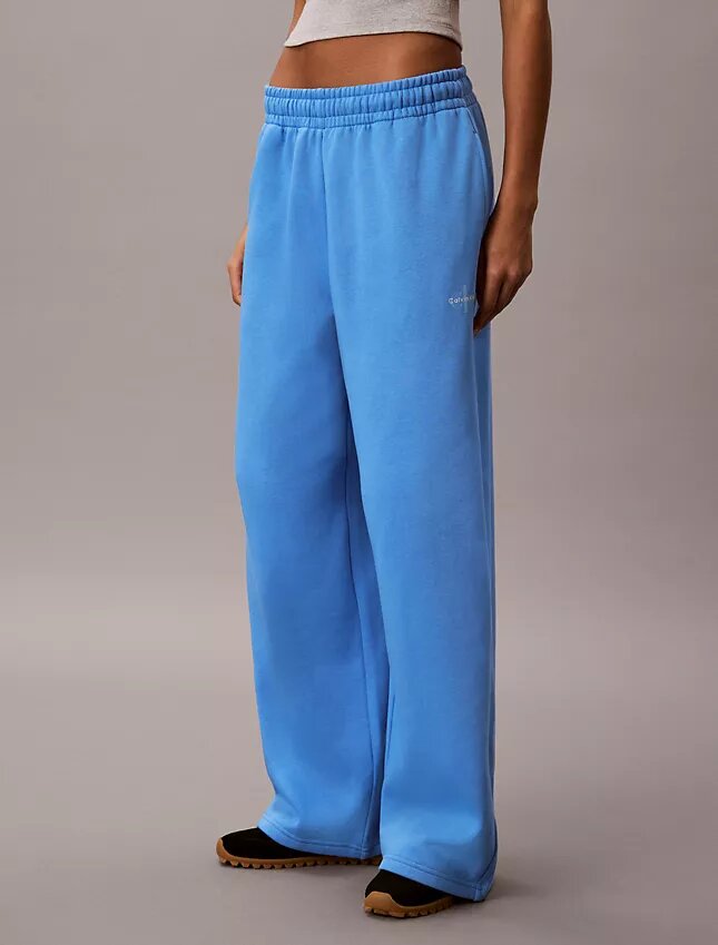 Pantaloni de trening din fleece cu croi larg Monologo Pantaloni de trening din fleece cu croi larg Monologo