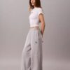 Pantaloni de trening din fleece cu croi larg Monologo Pantaloni de trening din fleece cu croi larg Monologo