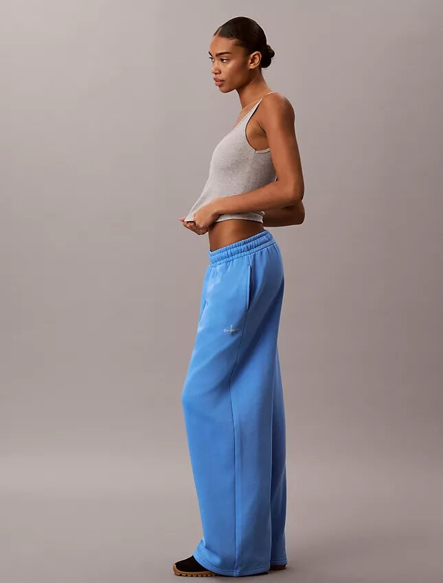 Pantaloni de trening din fleece cu croi larg Monologo Pantaloni de trening din fleece cu croi larg Monologo
