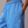 Pantaloni de trening din fleece cu croi larg Monologo Pantaloni de trening din fleece cu croi larg Monologo