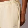 Pantaloni de trening din fleece cu croi larg Monologo Pantaloni de trening din fleece cu croi larg Monologo