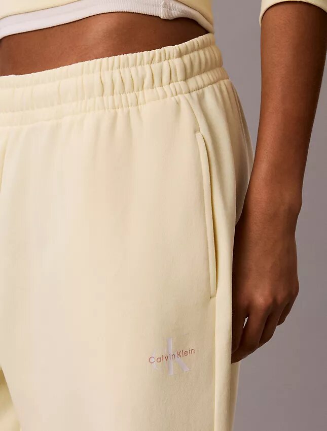 Pantaloni de trening din fleece cu croi larg Monologo Pantaloni de trening din fleece cu croi larg Monologo