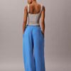 Pantaloni de trening din fleece cu croi larg Monologo Pantaloni de trening din fleece cu croi larg Monologo
