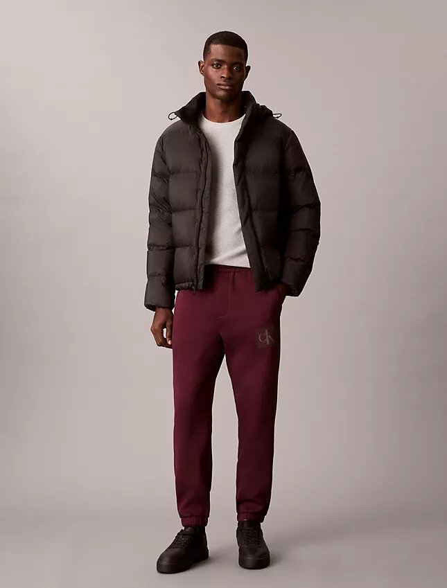 Pantaloni de trening din fleece cu imprimeu Monogram stratificat Pantaloni de trening din fleece cu imprimeu Monogram stratificat