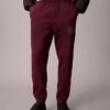 Pantaloni de trening din fleece cu imprimeu Monogram stratificat Pantaloni de trening din fleece cu imprimeu Monogram stratificat