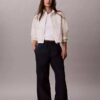 Pantaloni din denim tip parașută