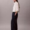 Pantaloni din denim tip parașută