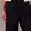 Pantaloni din denim tip parașută